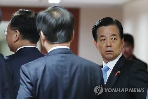 Defense Minister Han Min-koo attends a Cabinet meeting at the government complex in Seoul on Nov. 22. (Yonhap)