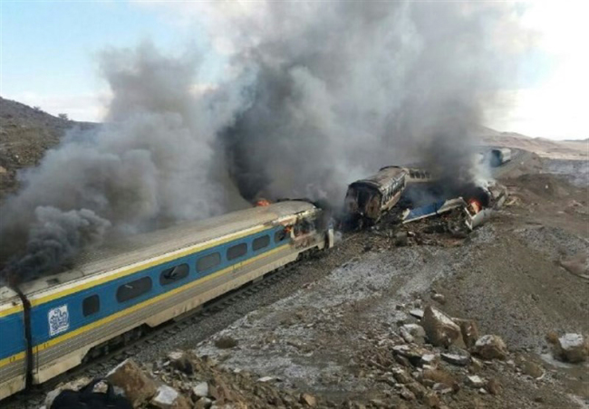 A handout picture released on November 25, 2016 by the Tasnim news agency shows damaged trains following an accident in the Semnan province, some 250 kms east of the Iranian capital Tehran. At least 31 people were killed in Iran early when an intercity express was hit by another train while stopped at a station, the provincial governor said. (AFP)