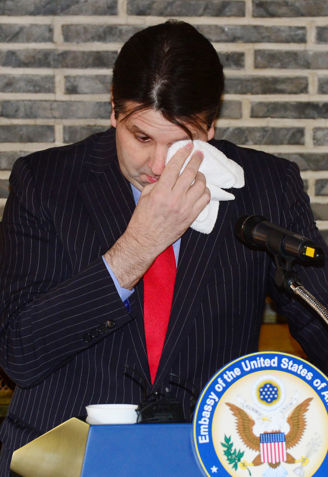 Mark Lippert, the outgoing US ambassador to Korea, wipes away tears while speaking during his farewell press conference at the US Embassy in Seoul on Friday. Joint Press Corps