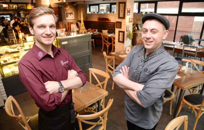 Kevin Scheid (left) and Gregory DeFraize, the owners of French bistro L'Empreinte, pose for a photo after an interview in their restaurant in Yeonnam-dong, Seoul, Wednesday. (Park Hyun-koo/The Korea Herald)