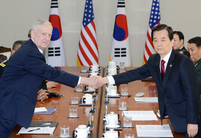 US Secretary of Defense James Mattis (left) meets with his South Korean counterpart Han Min-koo on Friday. Yonhap