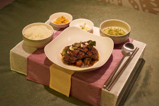 Braised beef short ribs with vegetables and steamed rice for business class customers. (Singapore Airlines)