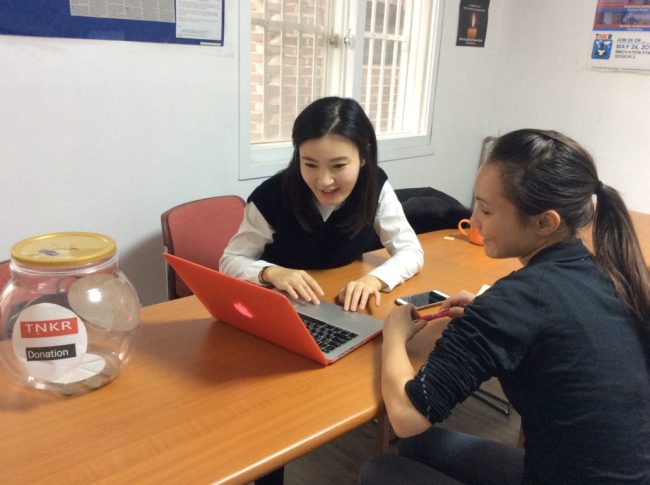 North Korean refugee Cherie Yang works on her script with a TNKR coach.(TNKR)