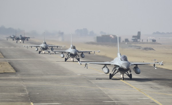 Fighter jets, including F-15Ks and KF-16s, operate at an air base in the city of Cheongju, North Chungcheong Province, Monday, as the Air Force conducts combat exercises. (Yonhap)