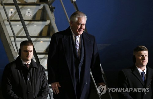 US Secretary of State Rex Tillerson (C) arrives in Tokyo on March 15, 2017. (AP-Yonhap)