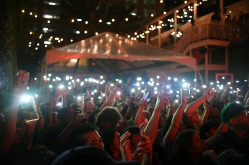 This photo provided by the Korea Creative Content Agency shows the crowd cheering at the 2017 South by Southwest's 