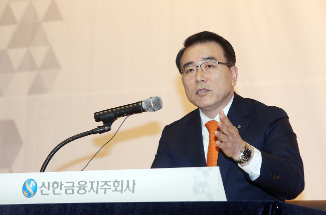 Cho Yong-byoung, chairman of Shinhan Financial Group, speaks at a press conference in Seoul, Monday. (Shinhan Financial Group)