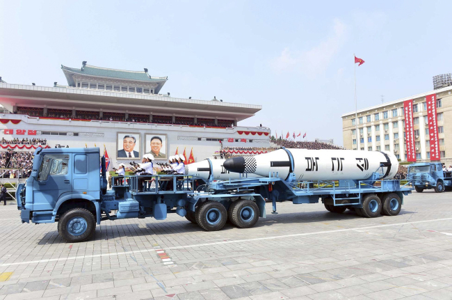 In this Saturday photo distributed by the North Korean government, Polaris submarine launched ballistic missiles (SLBM) are paraded to celebrate the 105th birth anniversary of Kim Il Sung, the country's late founder, in Pyongyang, North Korea. (Korean Central News Agency/Korea News Service via AP)
