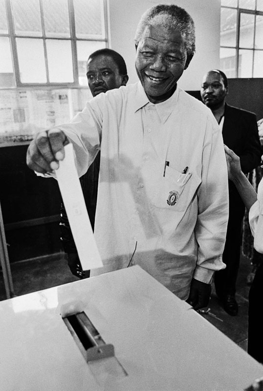 Nelson Mandela casts his first-ever vote at the 1994 elections, which ushered in a democratic post-apartheid era in South Africa. (Paul Weinberg/Wikipedia)