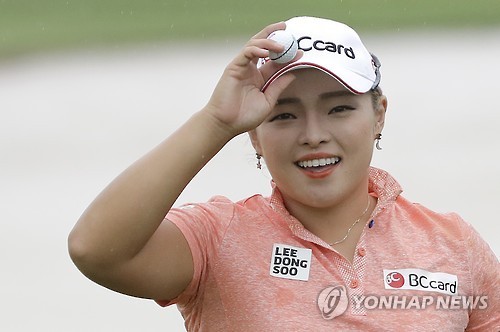 In this Associated Press photo taken on March 4, 2017, Jang Ha-na reacts after a shot at the first hole during the third round of the HSBC Women's Champions tournament on the LPGA Tour at Sentosa Golf Club's Tanjong Courser in Singapore. (Yonhap)
