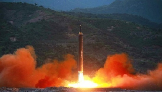This photo, released by the North's Rodong Sinmun daily on May 15, 2017, shows the launch of the Hwasong-12 missile the previous day. (For Use Only in the Republic of Korea. No Redistribution) (Yonhap)