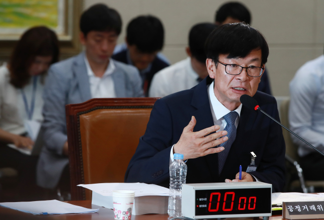 Fair Trade Commssion chief nominee Kim Sang-jo attends his confirmation hearing at the National Assembly on Friday. (Yonhap)