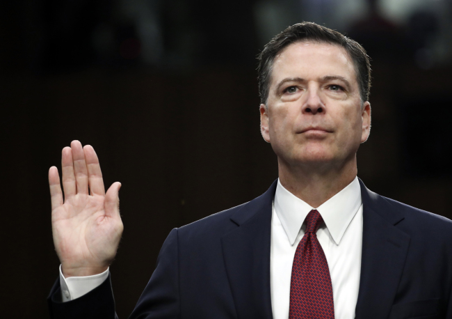 Former FBI director James Comey is sworn in during a Senate Intelligence Committee hearing on Capitol Hill, Thursday, June 8, in Washington. (AP-Yonhap)