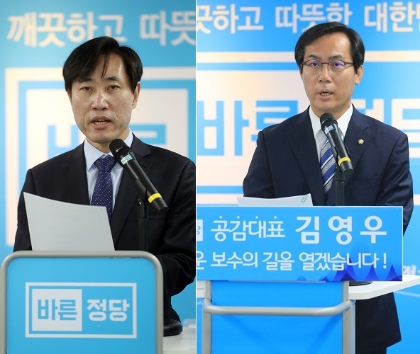 Reps. Ha Tae-keung and Kim Young-woo (Yonhap)