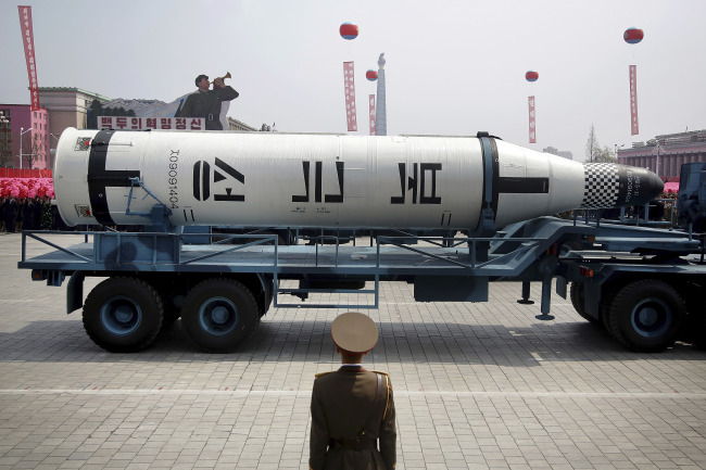 North Korean military shows its submarine-to-ground ballistic missile at a parade in Pyongyang in April. (AP-Yonhap)