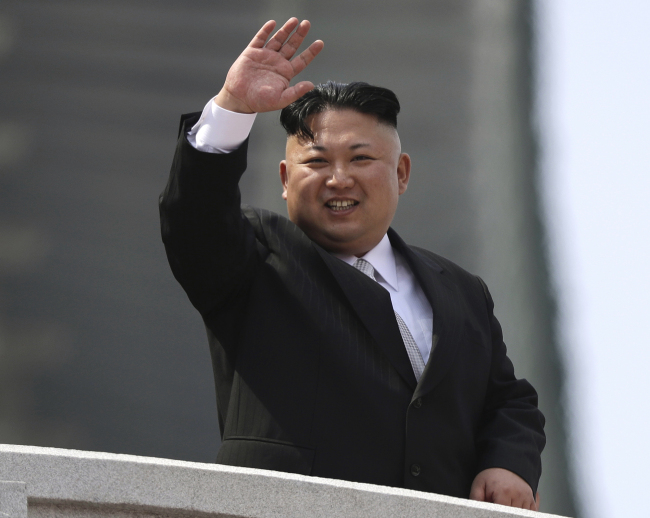 In this April 15, 2017 photo, North Korean leader Kim Jong Un waves during a military parade to celebrate the 105th birth anniversary of Kim Il Sung in Pyongyang, North Korea. (AP Photo)