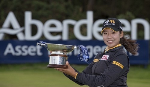 In this Associated Press photo taken on July 30, 2017, South Korean Lee Mi-hyang poses with the champion's trophy after winning the Aberdeen Asset Management Ladies Scottish Open at Dundonald Links in North Ayrshire, Scotland. (Yonhap)