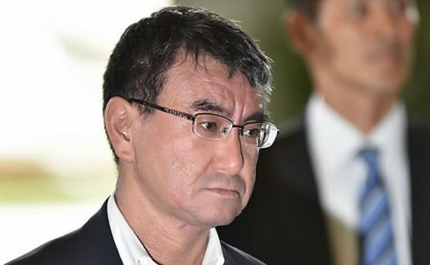 This photo released by AFP on Aug. 3, 2017, shows Taro Kono arriving at a government office in Tokyo. (Yonhap)