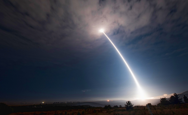In this image taken with a slow shutter speed and provided by Vandenberg Air Force Base, an unarmed Minuteman 3 missile launches from the base in California on Wednesday. (AP-Yonhap)