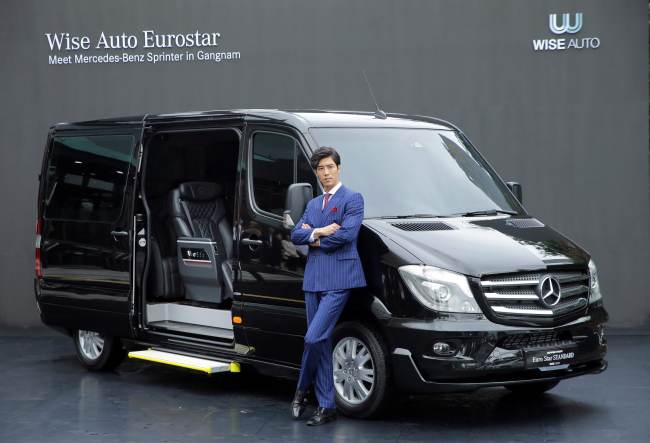 A model poses in front of the Mercedes-Benz Sprinter van dubbed Eurostar. (Photo courtesdy of Wise Auto Holdings)