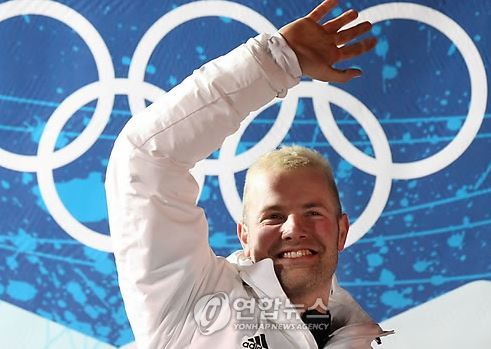 In this EPA file photo taken on Feb. 21, 2010, Andre Lange of Germany celebrates after winning the two-man bobsleigh gold medal at the Vancouver Winter Olympics at the Whistler Sliding Centre in Whistler, Canada. Lange was named a coach of the South Korean national luge team on Aug. 13, 2017. (Yonhap)