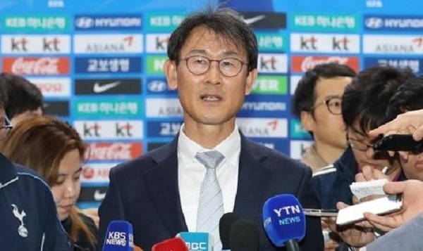 In this file photo taken on April 13, 2017, South Korea women`s football head coach Yoon Duk-yeo speaks to reporters at Gimpo International Airport in Seoul. (Yonhap)