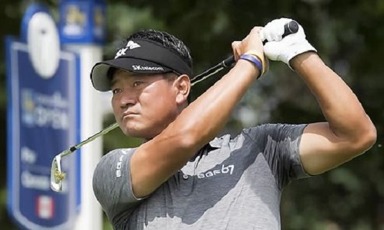 In this Associated Press file photo taken on July 27, 2017, Choi Kyoung-ju of South Korea watches his tee shot on the seventh hole during the first round of the RBC Canadian Open on the PGA Tour at Glen Abbey Golf Club in Oakville, Ontario. (Yonhap)