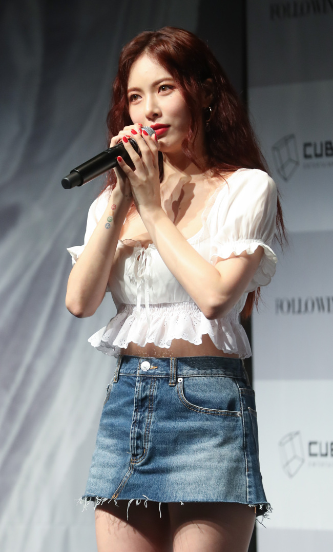 HyunA speaks at a press conference held Tuesday in Seoul. (Yonhap)