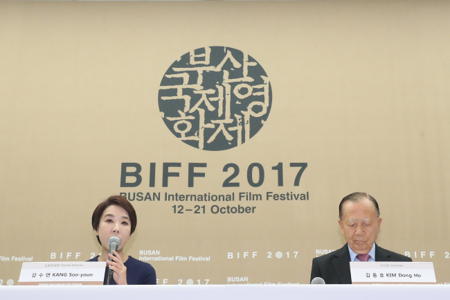 Busan International Film Festival’s Executive Director Kang Soo-youn (left) and Chairman Kim Dong-ho speak to press at the President Hotel in Jung-gu, Seoul, Monday. (Yonhap)