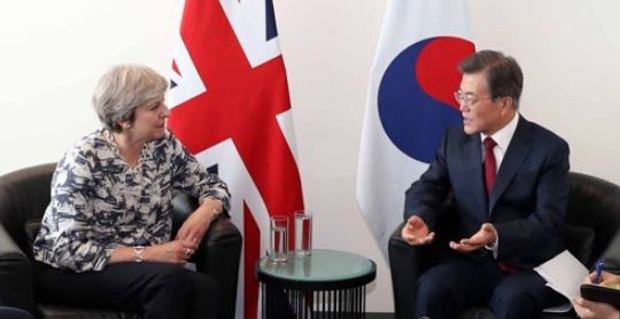 S. Korean, British leaders agree to seek peaceful resolution of NK nukes