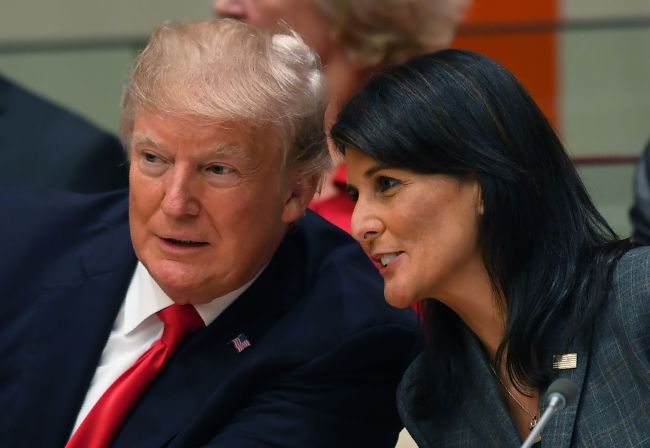 US President Donald Trump and US ambassador to the United Nations Nikki Haley speak during a meeting on United Nations Reform at the United Nations headquarters on September 18, 2017, in New York. (AFP-Yonhap)
