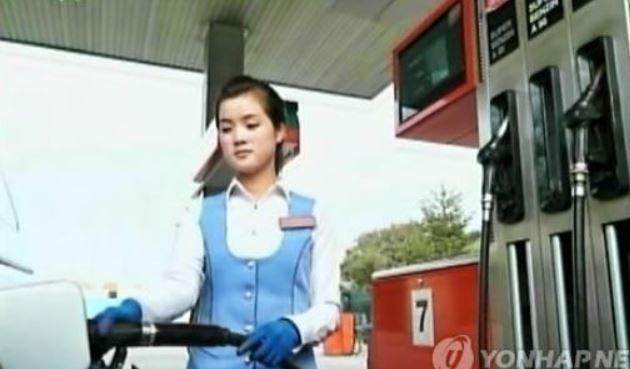 This file photo shows a worker at a gas station in Pyongyang. (Yonhap)