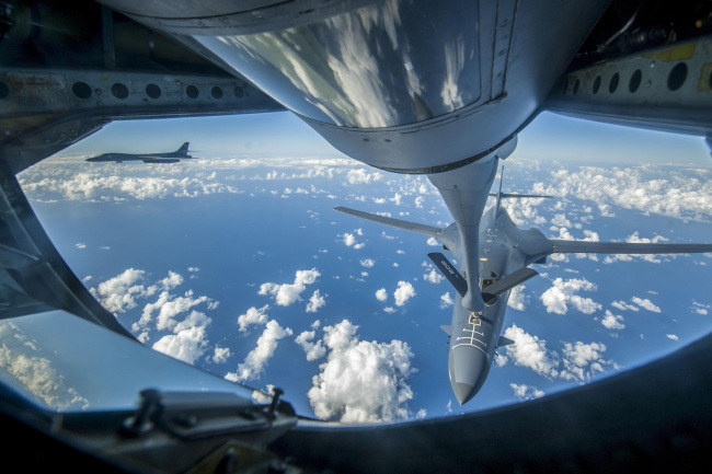 This US Air Force handout photo shows an Air Force B-1B Lancer receiving fuel from a KC-135 Stratotanker near the East China Sea. (AFP-Yonhap)/ US AIR FORCE