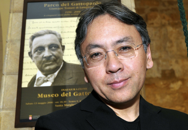 In this Saturday, Aug 8, 2009 file photo, author Kazuo Ishiguro poses for photographers before receiving the 