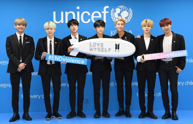 The seven members of BTS and pose during a press conference and agreement ceremony for “Love Myself,” UNICEF’ new project with BTS, in Seoul on Wednesday. (Korean Committee for UNICEF)