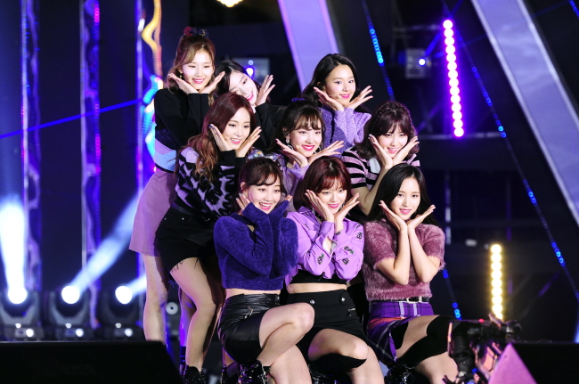 K-pop act Twice performs at a K-pop concert celebrating the upcoming 2018 PyeongChang Winter Olympics at Gwanghwamun Square in central Seoul on Wednesday. (The Korea Creative Content Agency)