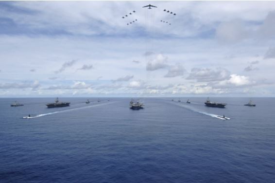 Three U.S. aircraft carriers -- USS Nimitz, USS Kitty Hawk, and USS John C. Stennis -- steam in formation during a 2007 training exercise in the Western Pacific in this photo released by the 7th Fleet. (Yonhap)