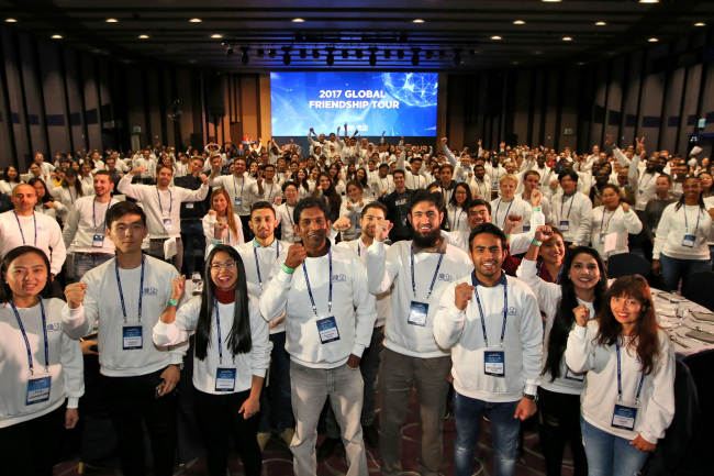 Participants of Hyundai Motor’s Global Friendship Tour pose for a photo during an event at a hotel in Goyang, Gyeonggi Province, Wednesday.(Hyundai Motor Group)