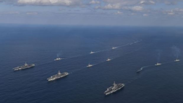 Three U.S. aircraft carriers steam in formation in the East Sea, leading South Korean and U.S. warships during the allies` joint naval exercise on Nov. 12, 2017, in this photo provided by South Korea`s Navy. (Yonnap)