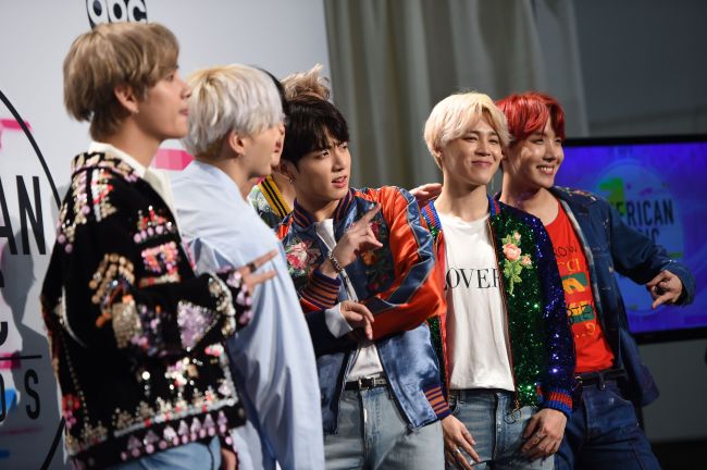 Boy band BTS poses in the press room at the 2017 American Music Awards, on Sunday in Los Angeles, California. (AFP-Yonhap)