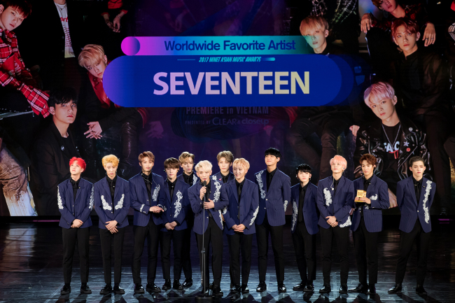 Seventeen receives the Worldwide Favorite Artist award at the 2017 Mnet Asian Music Awards at Hoa Binh Theater in Ho Chi Minh City, Vietnam, Saturday. (CJ E&M)
