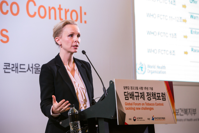 Kerstin Schotte, a medical officer at WHO’s Department of Prevention of Non-communicable Diseases speaks at a global forum on tobacco control held in Conrad Seoul on Friday. Korea Health Promotion Institute 