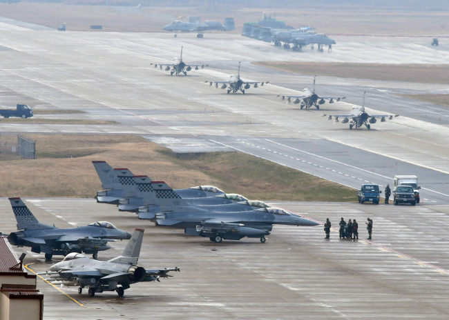 US military aircrafts taking part in the Vigilant Ace South Korea-US joint exercise are seen at the Osan Air Base in Gyeonggi Province on Tuesday. Yonhap