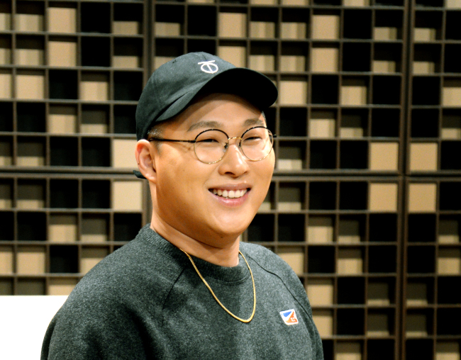 Rapper Swings poses during a recent interview with The Korea Herald in Seoul. (Park Hyun-koo / Korea Herald)