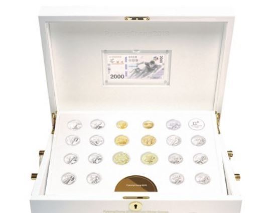 This image provided by POCOG shows a new deluxe coin set commemorating the 2018 PyeongChang Winter Olympics. The set is priced at 11 million won and will go on preorder starting Jan. 15, 2018. (Yonhap)