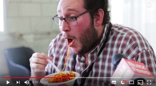 A YouTube capture of a foreigner trying Samyang Foods’ Buldak Spicy Chicken Ramen.(Buzzfeed)