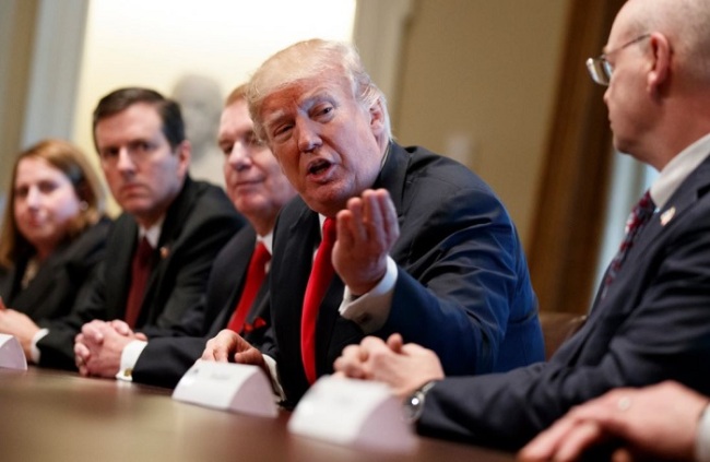Trump speaks during a meeting with steel and aluminum executives in the Cabinet Room of the White House, Thursday, March 1, in Washington. From left, Beth Ludwig of AK Steel, Roger Newport of AK Steel, John Ferriola of Nucor, Trump, and Dave Burritt of U.S. Steel Corporation. (AP)