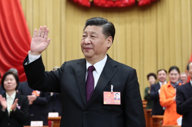Xi Jinping is elected Chinese president and chairman of the Central Military Commission of the People's Republic of China at the fifth plenary meeting of the first session of the 13th National People's Congress (NPC) at the Great Hall of the People in Beijing, capital of China, March 17. (Xinhua-Yonhap)