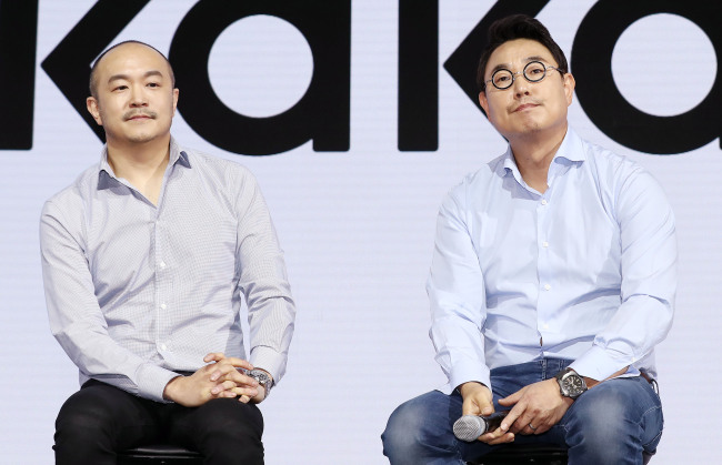 Kakao co-CEOs Joh Su-yong (left) and Yeo Min-soo speak during a press conference at the Westin Chosun hotel in Seoul, Tuesday. (Yonhap)