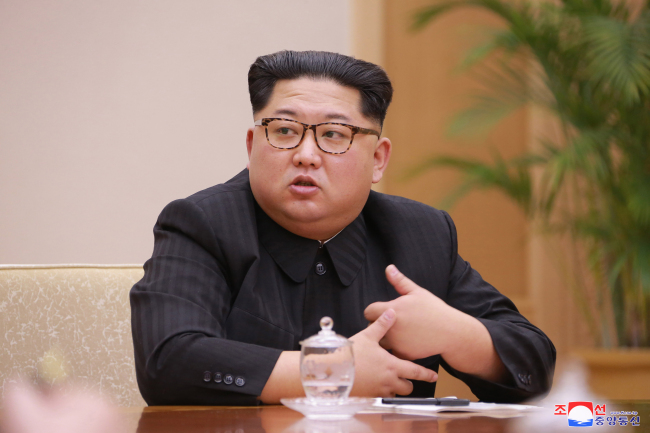 This photo, carried by North Korea`s state news agency on April 10, 2018, shows North Korean leader Kim Jong-un presiding over a meeting of the Political Bureau of the Central Committee of the ruling Workers` Party of Korea a day earlier. (For Use Only in the Republic of Korea. No Redistribution) (Yonhap)